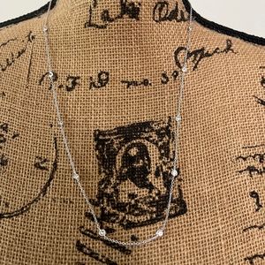 Diamond Station necklace (Faux diamonds and silver metal) NWOT